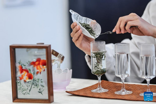 A tea master demonstrates tea brewing during a Chinese tea cultural event in Budapest, Hungary, on May 19, 2026. [Photo by David Balogh/Xinhua]